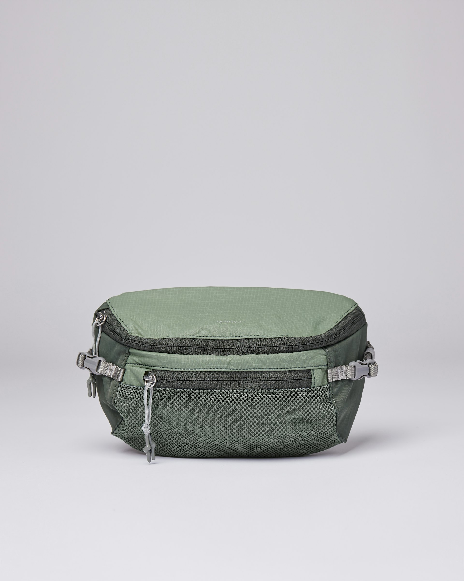 Lo belongs to the category Bum bags and is in color lichen green