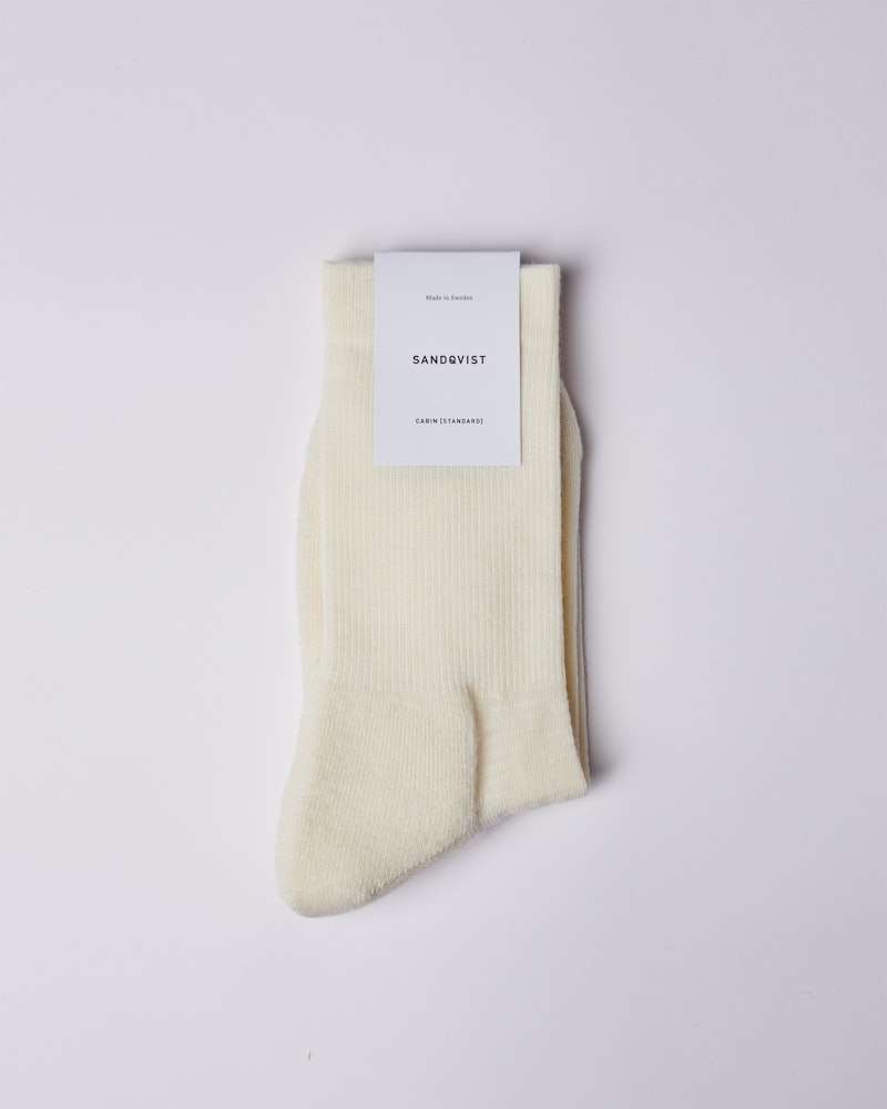 Wool sock belongs to the category Items and is in color off white