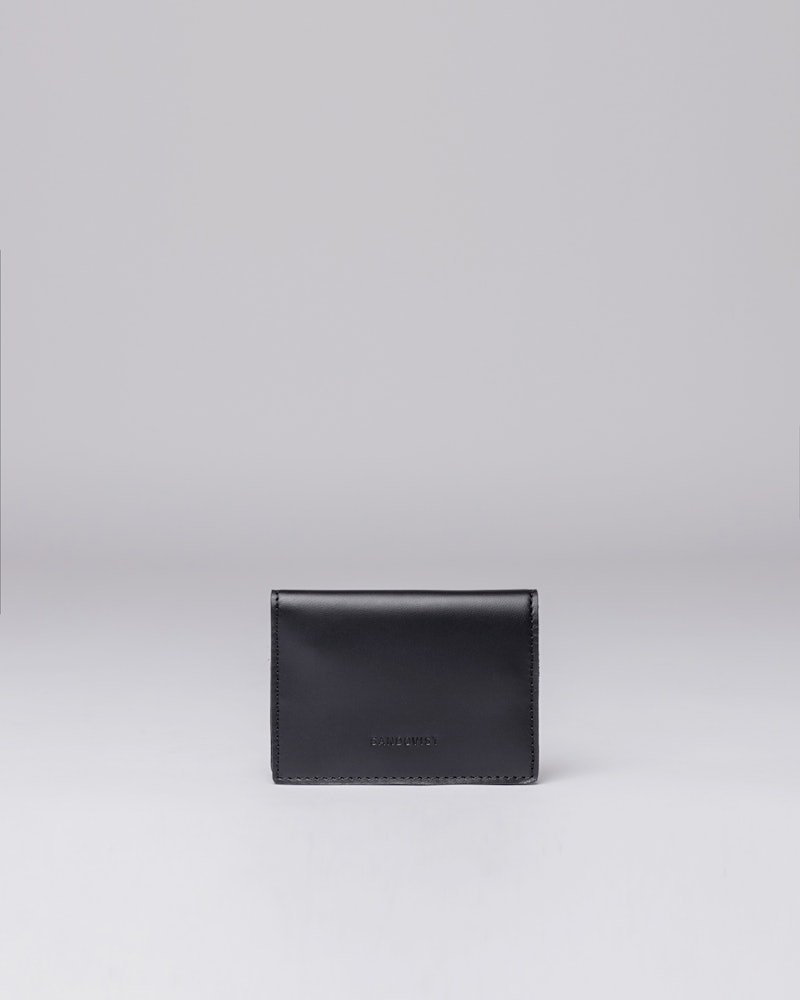 Noomi belongs to the category Wallets and is in color black