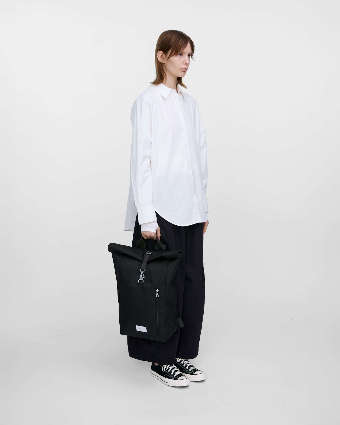 GROUND Rolltop Backpack L is in color black (10 of 12)