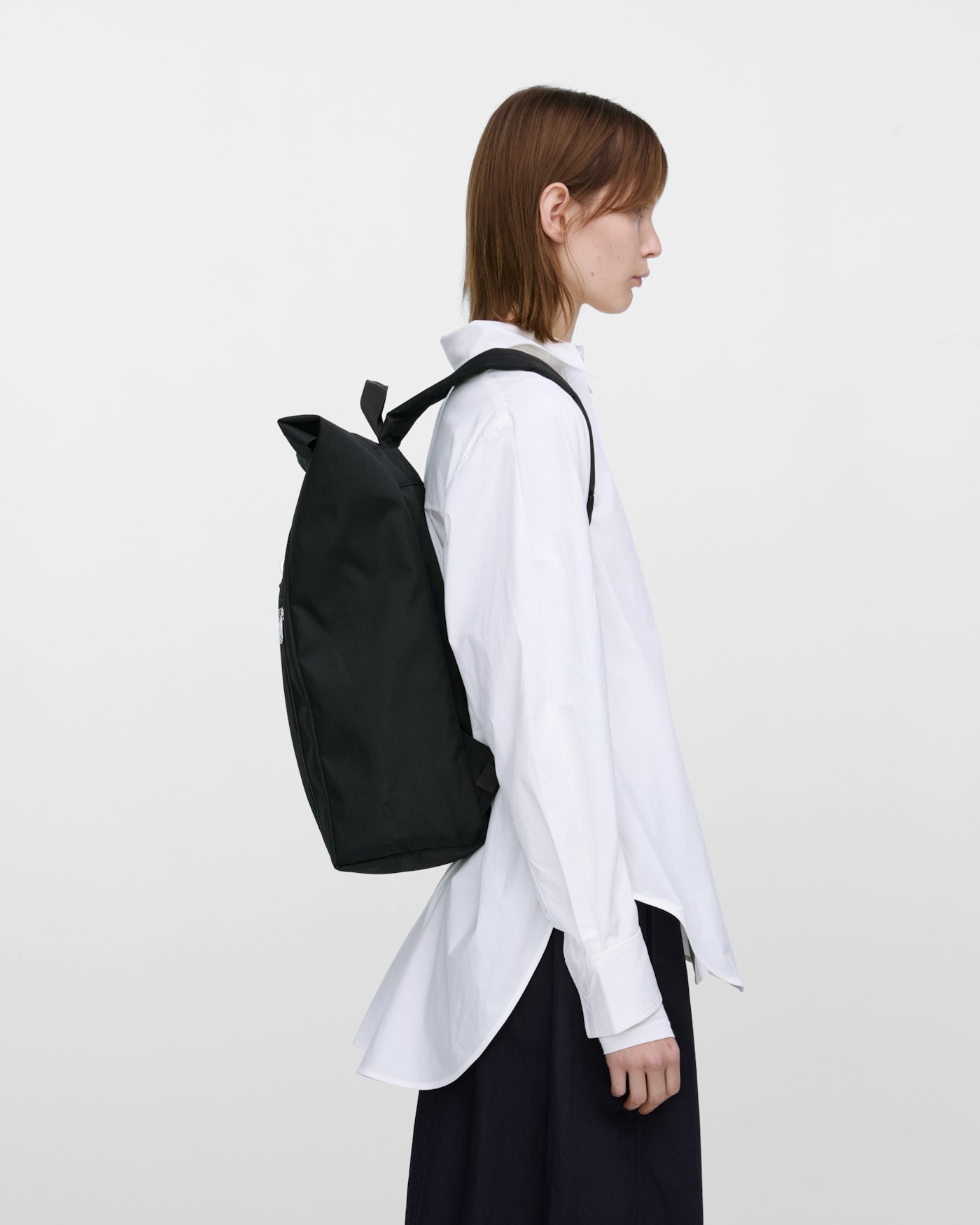 GROUND Rolltop Backpack L is in color black (9 of 12)