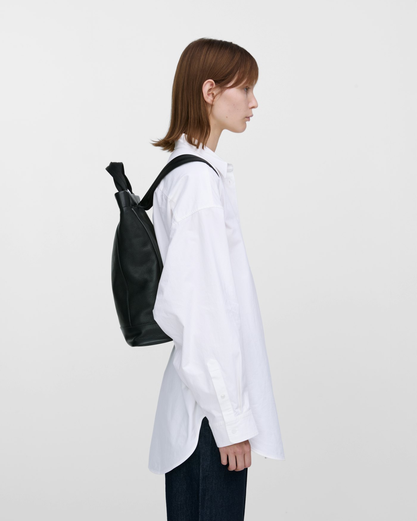 Leather Tote Backpack is in color black (9 of 9)