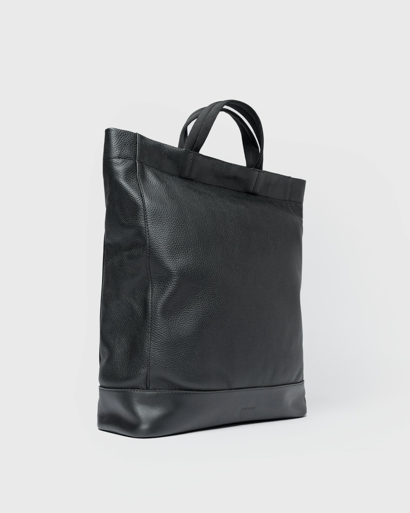 Leather Tote Backpack is in color black (2 of 9)