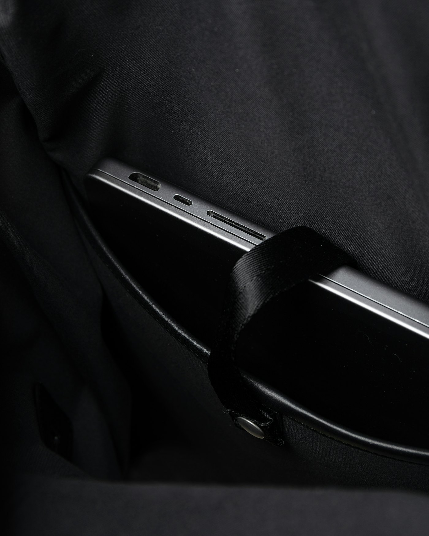 Leather rolltop backpack is in color black (4 of 15)