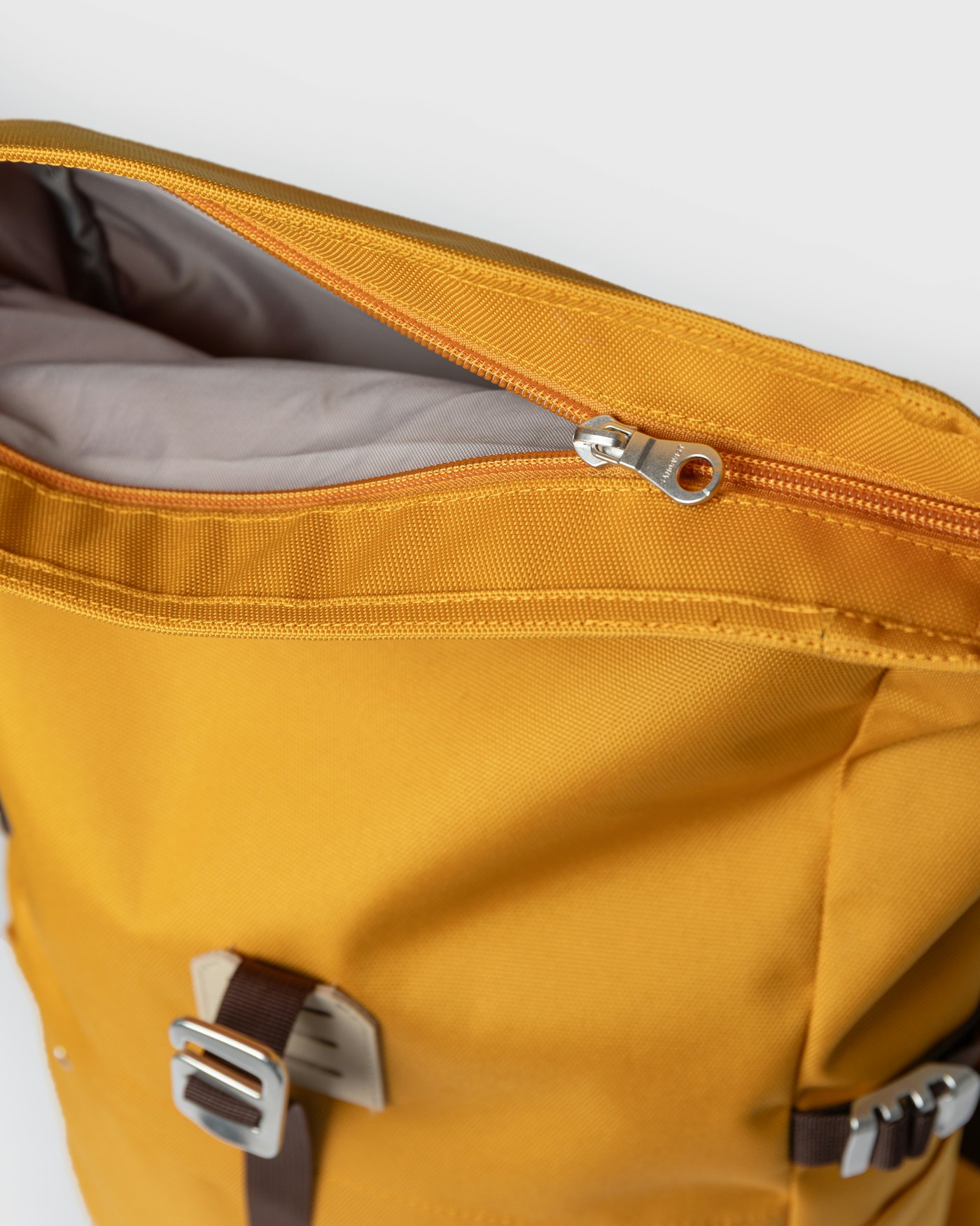 ICON Rolltop backpack M is in color golden yellow (7 of 8)