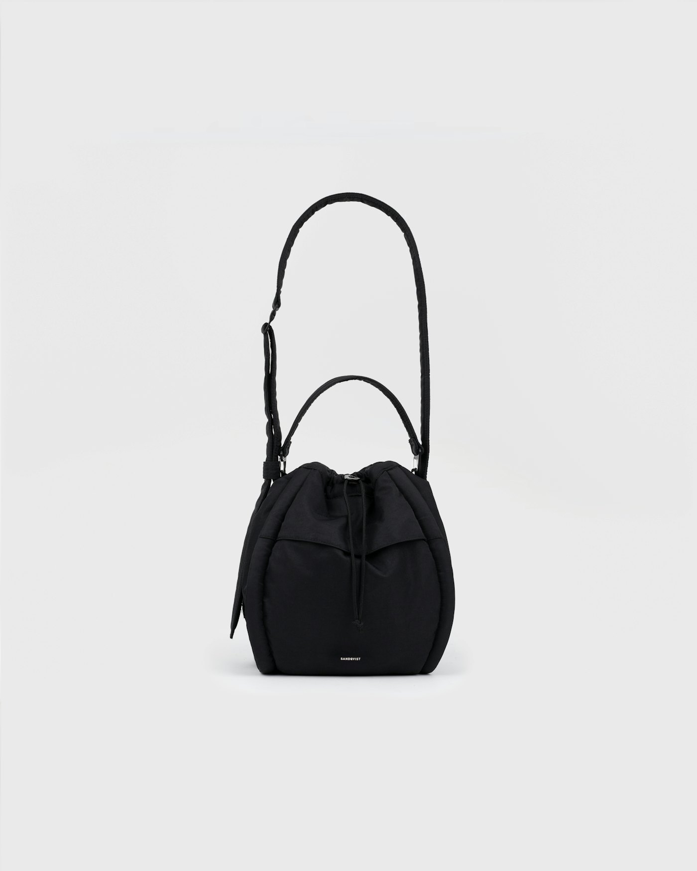 CURVE Bucket Bag is in color black (1 of 15)
