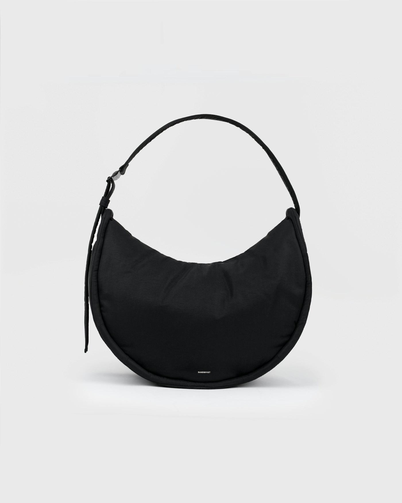 CURVE Half Moon Bag is in color black (1 of 18)