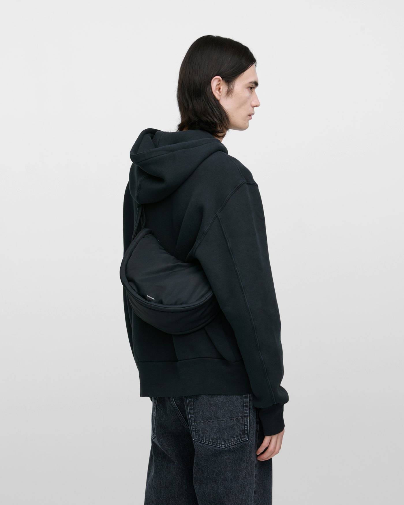 CURVE Half Moon Bag Mini is in color black (9 of 17)