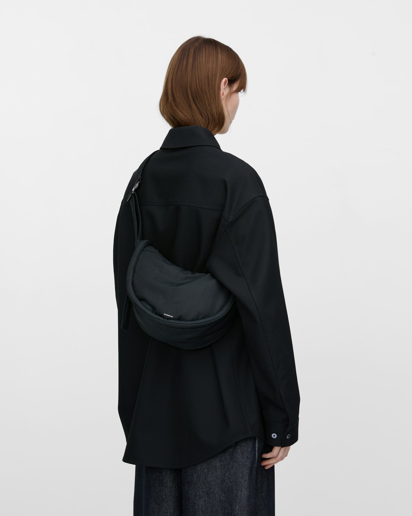 CURVE Half Moon Bag Mini is in color black (12 of 17)