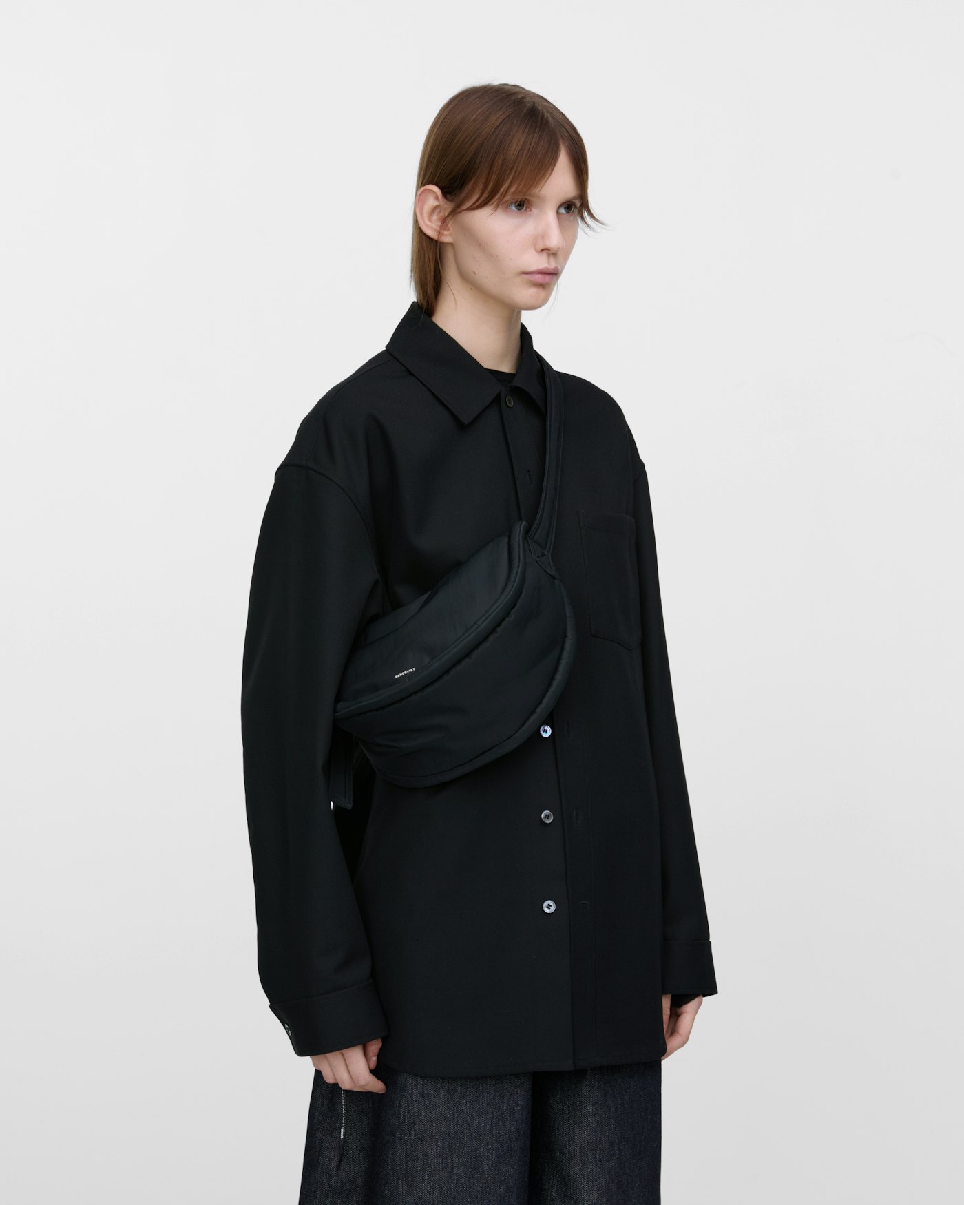 CURVE Half Moon Bag Mini is in color black (11 of 17)