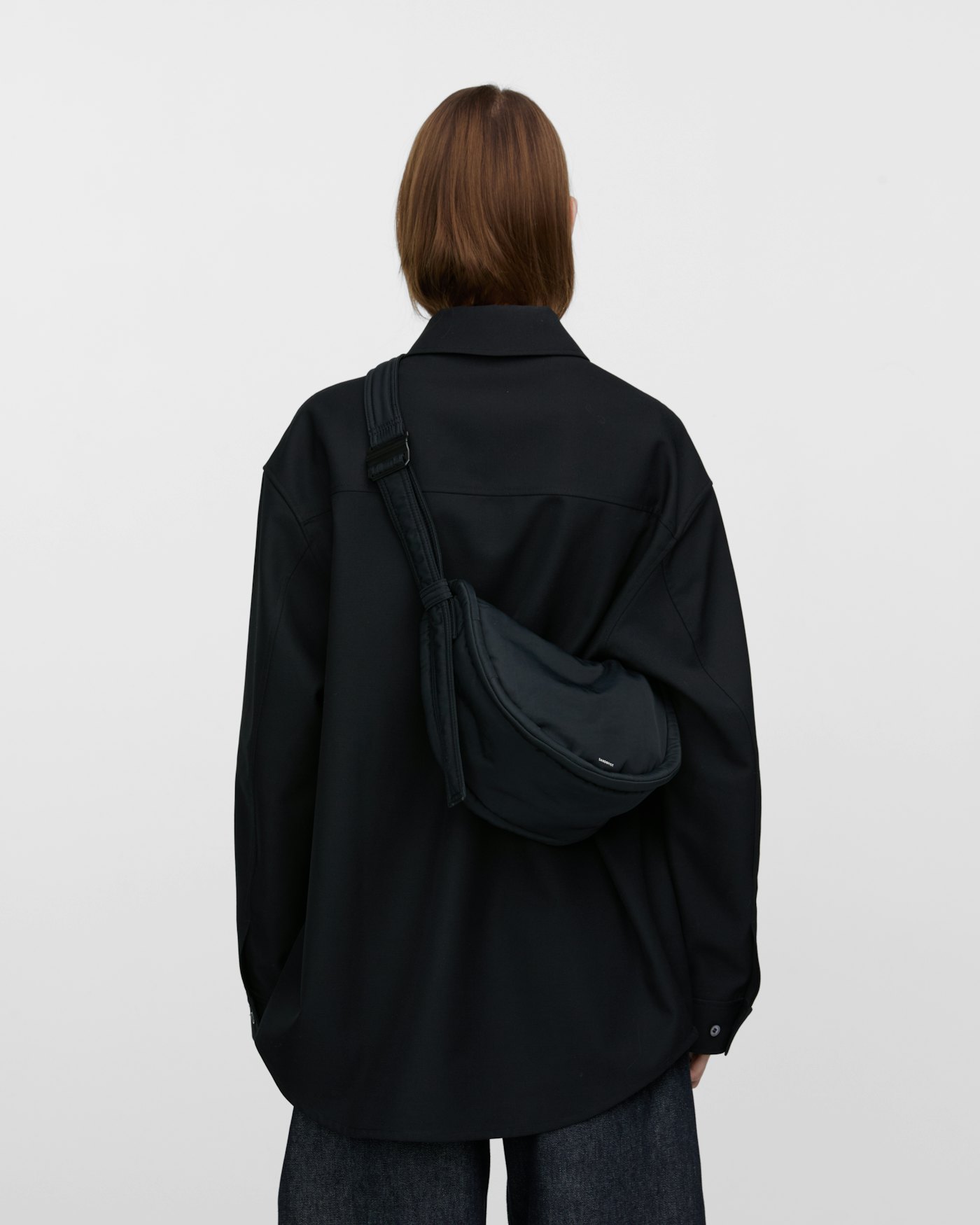 CURVE Half Moon Bag Mini is in color black (13 of 17)