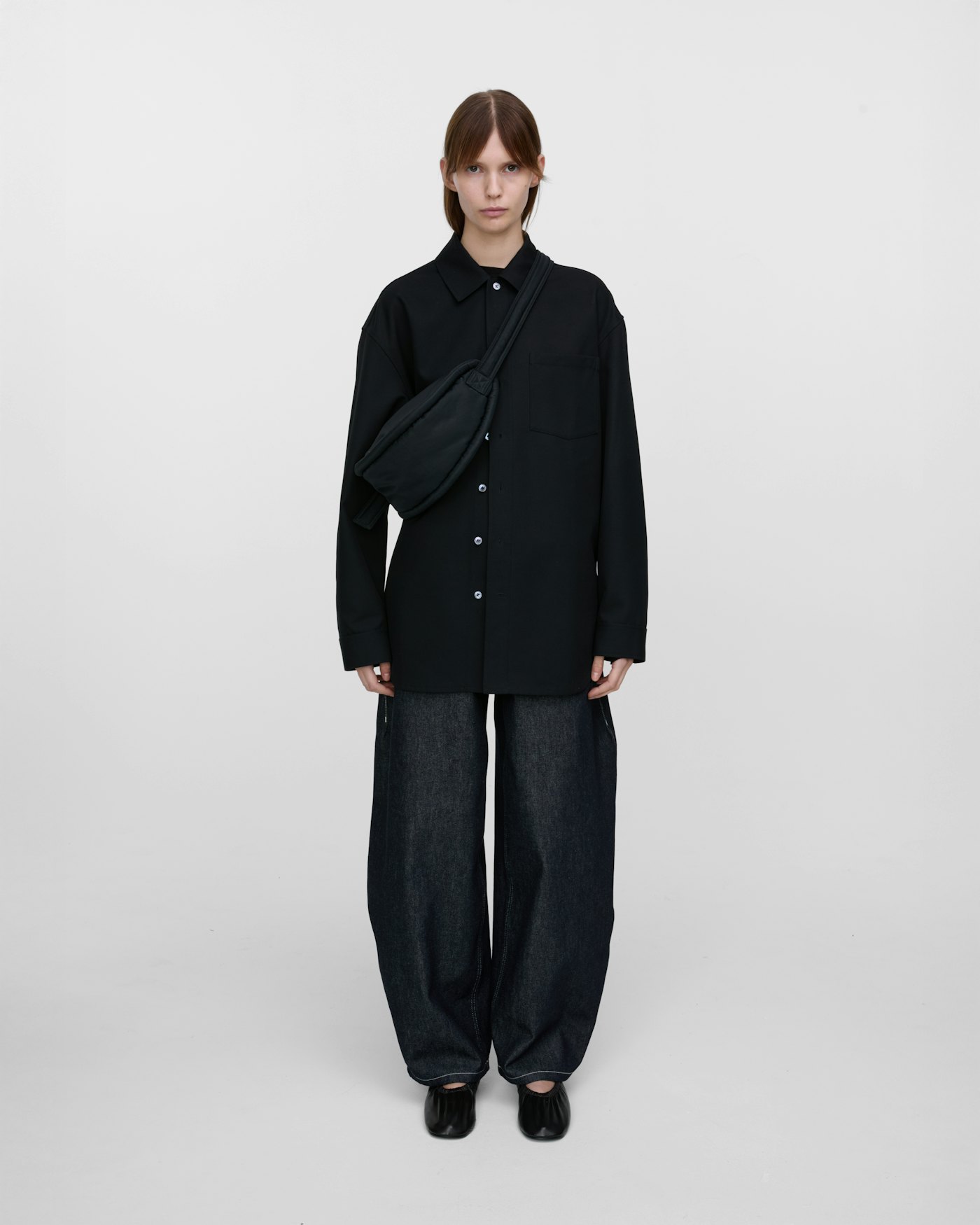 CURVE Half Moon Bag Mini is in color black (17 of 17)