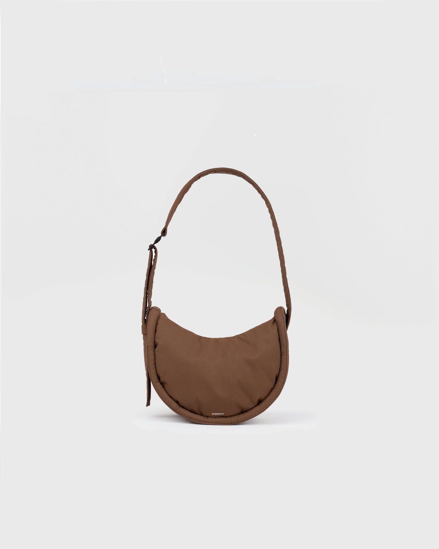 CURVE Half Moon Bag Mini is in color dark taupe (1 of 15)