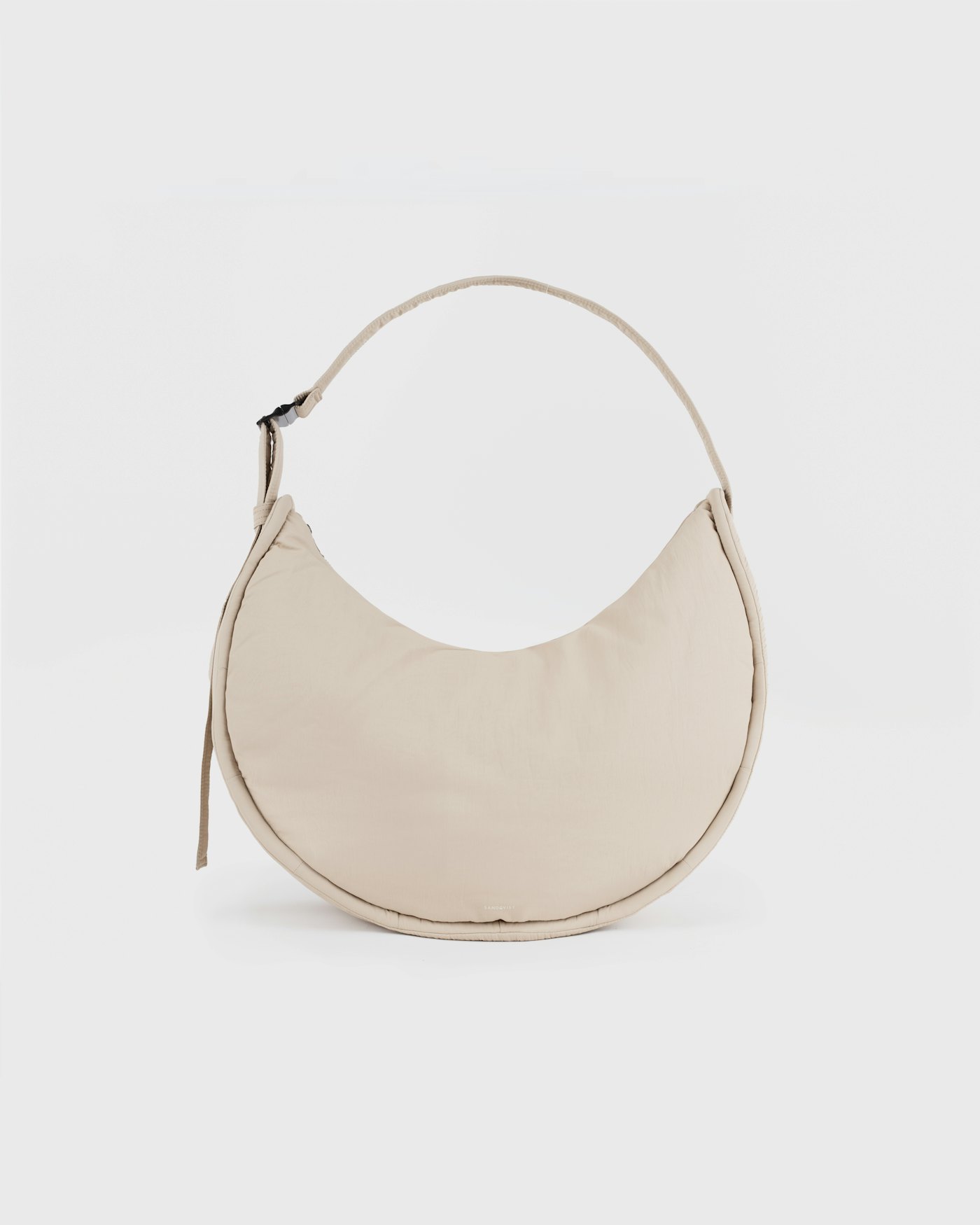 CURVE Half Moon Bag est en couleur beige (1 de 5)