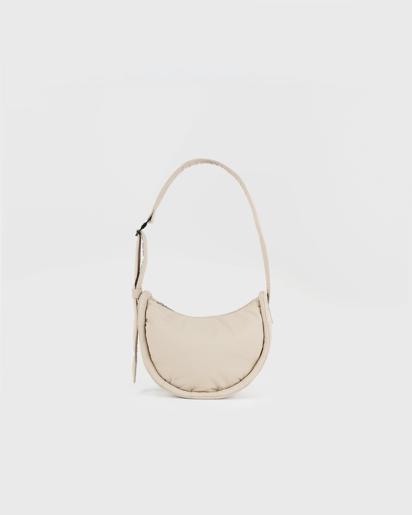 CURVE Half Moon Bag Mini est en couleur beige (1 de 5)